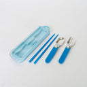 Blue travel cutlery set with case on a light gray background