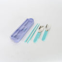 Children's cutlery set with a purple case on a white background