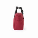 A red insulated lunch bag with a black fabric top handle, shown from the front on a clean white background leakproof | Spixal