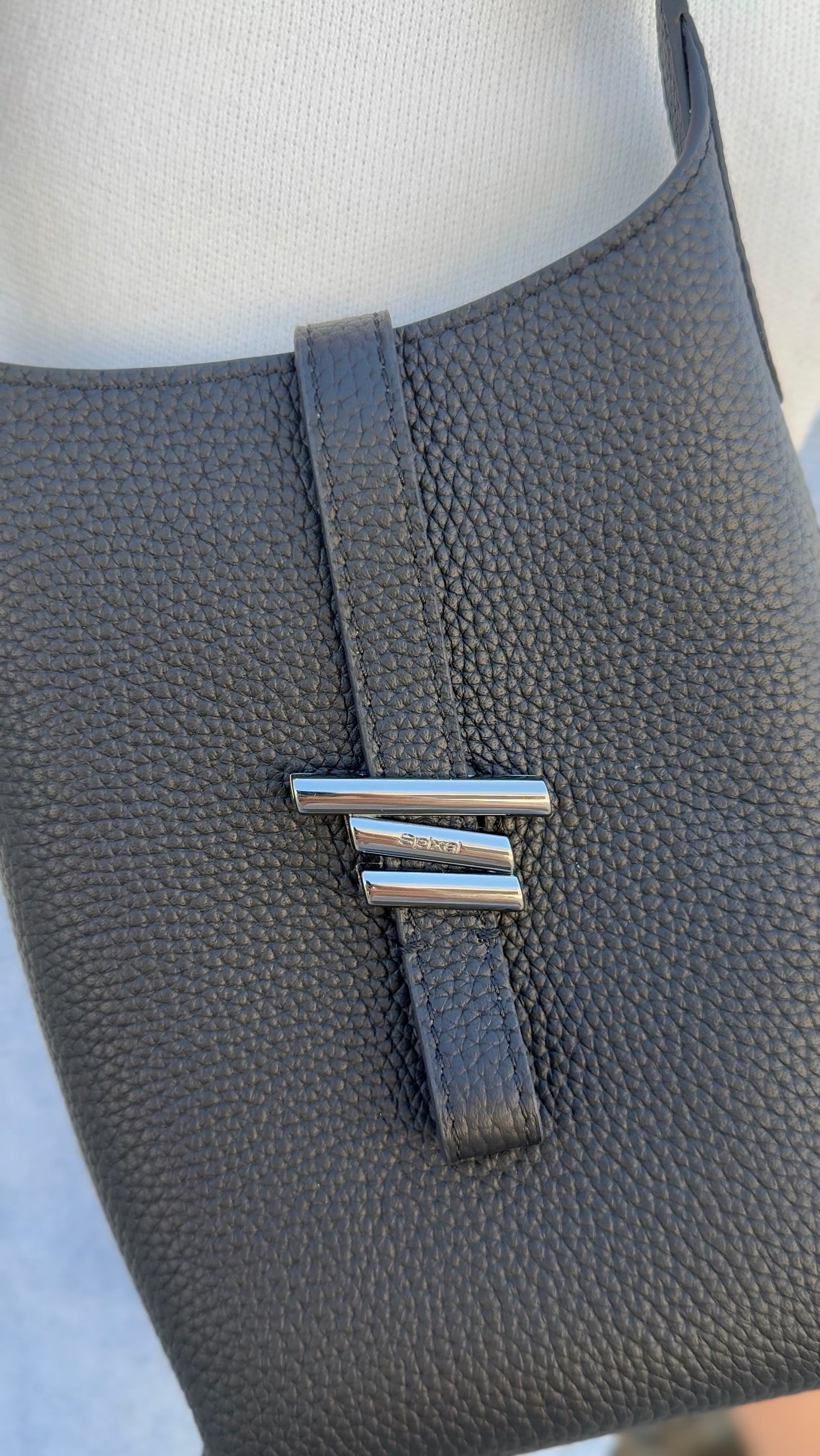Leather coin purse inside matching leather handbag
