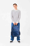 Large blue Axis school bag carried by teen school boy | Spixal