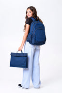 Large blue Axis school bag and homework folder carried by school girl matching set | Spixal