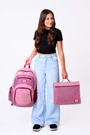 Large pink school bag and homework folder carried by school girl matching set | Spixal