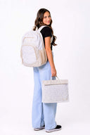 Large leopard print Axis school bag and homework folder carried by school girl matching set | Spixal