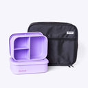Purple bento box with compartments and a black carrying case on a white background